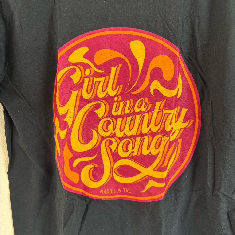 Maddie and Tae Black Tee with Girl in a Country song logo